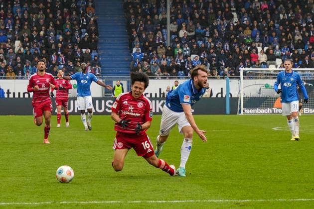 2 Bundesliga SV Darmstadt 98 vs Fortuna Düsseldorf, Merck Stadion am Böllenfalltor, 21 02 2026 duel between Satoshi Tanaka Fortuna Düsseldorf, 16 and Killian Corredor SV Darmstadt 98, 34 2 Bundesliga SV Darmstadt 98 vs Fortuna Düsseldorf, Merck Stadion am Böllenfalltor, 21 02 2026 DFB DFL REGULATIONS PROHIBIT ANY USE OF PHOTOGRAPHS AS IMAGE SEQUENCES AND OR QUASI VIDEO Copyright: xBEAUTILUSxSPORTS Hillx