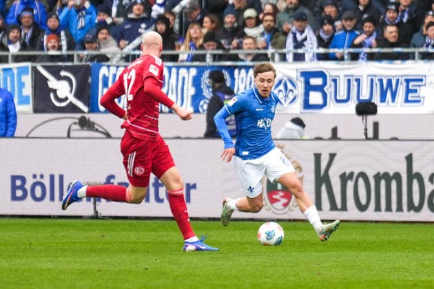 2 Bundesliga SV Darmstadt 98 vs Fortuna Düsseldorf, Merck Stadion am Böllenfalltor, 21 02 2026 duel between Valgeir Lunddal Friðriksson Fortuna Düsseldorf, 12 and on the ball Luca Marseiler SV Darmstadt 98, 8 2 Bundesliga SV Darmstadt 98 vs Fortuna Düsseldorf, Merck Stadion am Böllenfalltor, 21 02 2026 DFB DFL REGULATIONS PROHIBIT ANY USE OF PHOTOGRAPHS AS IMAGE SEQUENCES AND OR QUASI VIDEO Copyright: xBEAUTILUSxSPORTS Hillx