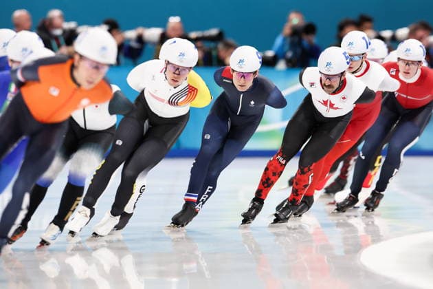 ITALY, MILAN - FEBRUARY 21, 2026: Indra Medard (3rd L) of Belgium, Mathieu Belloir (C) of France, Antoine Gelinas-Beaulieu (3rd R) of Canada, and Vladimir Semirunniy (2nd R) of Poland compete in the men s mass start Speed skating, Eisschnelllauf semifinal race at Milano Speed Skating Stadium during the 2026 Winter Olympic Games, Olympische Spiele, Olympia, OS Peter Kovalev TASS  89039529