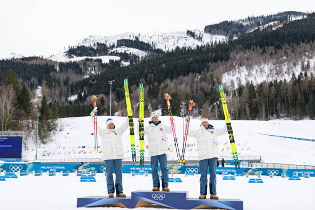 (260221) -- TESERO, Feb. 21, 2026 -- Gold medalist Johannes Hoesflot Klaebo (C) of Norway, silver medalist Martin Loewstroem Nyenget (L) of Norway and bronze medalist Emil Iversen of Norway pose on the podium after the cross-country skiing men s 50km mass start classic event at the Milan-Cortina 2026 Olympic Winter games, Winterspiele,Spiele, Summer games in Tesero, Italy, Feb. 21, 2026. ) (MICO2026)ITALY-TESERO-OLYMPIC WINTER GAMES-CROSS-COUNTRY SKIING-MEN S 50KM MASS START-CLASSIC HuangxWei 