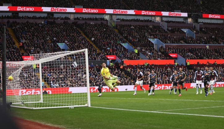 Emiliano Martinez (AV) cannot save the free-kick from Anton Stach (LU) as he scored the first Leeds goal (0-1) at the Aston Villa v Leeds United EPL match, at Villa Park, Birmingham, UK on 21st February, 2026. 