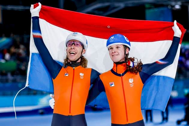 winner Jorrit Bergsma of the Netherlands and Stijn Van De Bunt of the Netherlands celebrating and holding flag after Men s Mass Start Final, Milano Cortina 2026 Winter Olympics: Day 15, Speed skating, Eisschnelllauf - Milano Cortina 2026 Winter Olympics: Day 15, Milano Speed Skating Stadium, February 21, 2026, Milan, Italy.