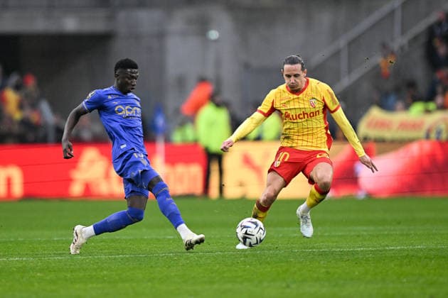RC Lens v AS Monaco - Ligue 1 McDonald s 2025 2026 10 Florian THAUVIN (rcl) - 15 Lamine CAMARA (asm) during the Ligue 1 McDonald s match between Lens and Monaco at Stade Bollaert-Delelis on February 21, 2026 in Lens, France. Lens France  Copyright: xFEPx 776348298
