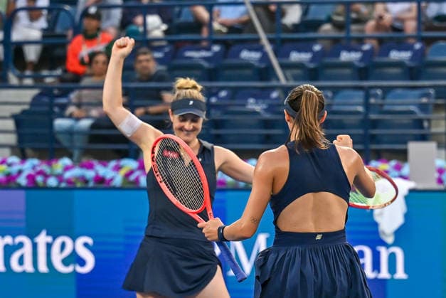 2026 Dubai Duty Free Tennis Championships DUBAI, UAE - FEBRUARY 21: Canadian Gabriela Dabrowski (L) and Brazilian Luisa Stefani (R) celebrate after winning the women’s doubles final of the Dubai Duty Free Tennis Championships match against German tennis player Laura Siegemund and Russian tennis player Vera Zvonareva at the Dubai Duty Free Tennis Stadium in Dubai, United Arab Emirates, on February 21, 2026. Waleed Zein Anadolu Dubai United Arab Emirates. Editorial use only. Please get in touch for any other usage.  Copyright: x2026xAnadoluxWaleedxZeinx