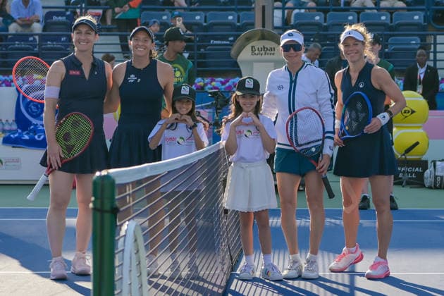2026 Dubai Duty Free Tennis Championships DUBAI, UAE - FEBRUARY 21: Canadian Gabriela Dabrowski (L) and Brazilian Luisa Stefani (2nd L) celebrate after winning the women’s doubles final of the Dubai Duty Free Tennis Championships match against German tennis player Laura Siegemund and Russian tennis player Vera Zvonareva at the Dubai Duty Free Tennis Stadium in Dubai, United Arab Emirates, on February 21, 2026. Waleed Zein Anadolu Dubai United Arab Emirates. Editorial use only. Please get in touch for any other usage.  Copyright: x2026xAnadoluxWaleedxZeinx