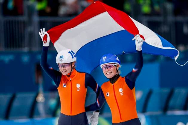 winner Marijke Groenewoud of the Netherlands and Bente Kerkhoff of the Netherlands celebrating and holding flag after Women s Mass Start Final, Milano Cortina 2026 Winter Olympics: Day 15, Speed skating, Eisschnelllauf - Milano Cortina 2026 Winter Olympics: Day 15, Milano Speed Skating Stadium, February 21, 2026, Milan, Italy.