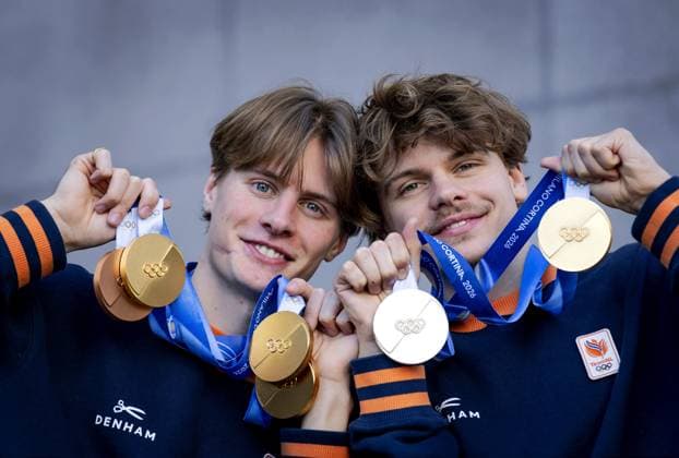 MILAN - A double portrait of brothers Jens (l) and Melle van t Wout with their medals at the Winter Olympics. Short track speed skater Jens van t Wout, with three gold medals and a bronze, is the most successful Dutch male athlete at a single Winter games, Winterspiele,Spiele, Summer games His brother Melle won not only gold in the relay, but also silver in the 500 meters. ROBIN VAN LONKHUIJSEN ANP xVIxANPxSportx xxANPxIVx 551379982 originalFilename: 551379982.jpg