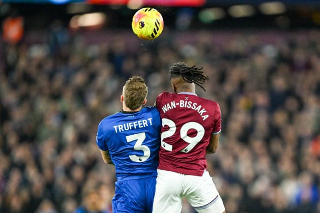 West Ham United v Bournemouth, Premier League AFC Bournemouth defender Adrien Truffert (3) and West Ham United defender Aaron Wan-Bissaka (29) challenge for a header during the Premier League match between West Ham United and Bournemouth at the London Stadium, London, UK on 21 February 2026. London London Stadium UK Editorial use only DataCo restrictions apply See www.football-dataco.com , Copyright: xSimonxTraylenx PSI-23788-0003