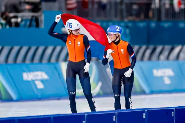 winner Marijke Groenewoud of the Netherlands and Bente Kerkhoff of the Netherlands celebrating and holding flag after Women s Mass Start Final, Milano Cortina 2026 Winter Olympics: Day 15, Speed skating, Eisschnelllauf - Milano Cortina 2026 Winter Olympics: Day 15, Milano Speed Skating Stadium, February 21, 2026, Milan, Italy.
