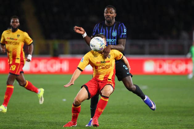 Ylber Ramadani of US Lecce and Marcus Thuram of FC Internazionale Milano compete for the ball during the serie A match between US Lecce and FC Internazionale Milano at Ettore Giardiniero - Via del Mare stadium in Lecce (Italy), February 21, 2026. massimilianoxcarnabuci