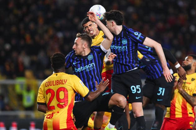 Alessandro Bastoni of FC Internazionale Milano and Danilo Veiga of US Lecce compete for a header during the serie A match between US Lecce and FC Internazionale Milano at Ettore Giardiniero - Via del Mare stadium in Lecce (Italy), February 21, 2026. massimilianoxcarnabuci