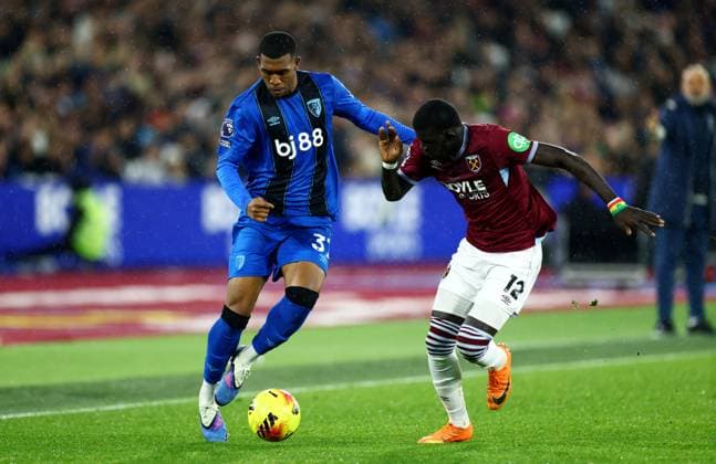 Rayan of AFC Bournemouth and El Hadji Malick Diouf of West Ham United. West Ham United v AFC Bournemouth, Premier League, Football, London Stadium, London, UK - 21 Feb 2026London London Stadium United Kingdom EDITORIAL USE ONLY No use with unauthorised audio, video, data, fixture lists, club league logos or live services. Online in-match use limited to 120 images, no video emulation. No use in betting, games or single club league player publications. Copyright: xJamesxMarsh Shutterstockx 16681538as