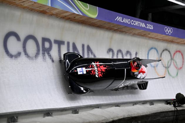 Cortina d Ampezzo, Italy, February 21th 2026. Cynthia Appiah and Dawn Richardson Wilson of Canada in action during the Bobsleight 2-woman Heat 3 and 4 race of the Olympic Winter games, Winterspiele,Spiele, Summer games 2026 in Cortina d Ampezzo, Italy. (Photo by Igor Kupljenik Sports Press Photo)  Copyright: xIgorxKupljenikx xSPPx Sportspressphoto_SPR95645