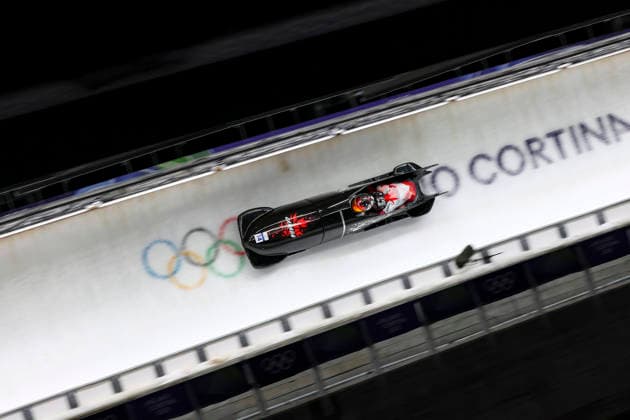 OLYMPICS - Winter Olympic Games, Olympische Spiele, Olympia, OS Milano Cortina 2026 CORTINA D AMPEZZO,ITALY,21.FEB.26 - OLYMPICS, BOBSLEIGH - Winter Olympic Games Milano Cortina 2026, 2-woman, heat 3 and 4. Image shows Cynthia Appiah and Dawn Richardson Wilson (CAN).  GEPAxpictures xMaticxKlansek