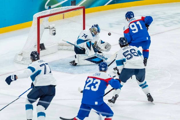 February 21, 2026, Milan, Lombardy, Italy: Goalkeeper Juuse Saros 74 of Team Finland saves a goal against Team Slovakia in the Mens Team Slovakia Vs Team Finland Bronze Medal Game game at the Milano Santagiulia Ice hockey, Eishockey Arena in MILAN, Italy during the 2026 Milano Cortina Winter Olympics. Milan Italy - ZUMAa161 20260221_oly_a161_011 Copyright: xWalterxG.xArcex