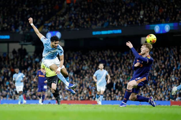 Manchester, England, 21st February 2026. Omar Marmoush of Manchester City shot blocked by Lewis Hall of Newcastle United during the Manchester City vs Newcastle United Premier League match at the Etihad Stadium, Manchester. Picture credit should read: Cody Froggatt Sportimage EDITORIAL USE ONLY. No use with unauthorised audio, video, data, fixture lists, club league logos or live services. Online in-match use limited to 120 images, no video emulation. No use in betting, games or single club league player publications. SPI_036_CF_Man_City_Newc SPI-4542-0035