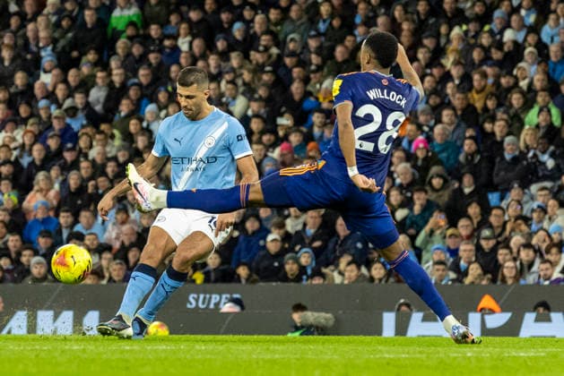 21st February 2026; Etihad Stadium, Manchester, Lancashire, England; Premier League Football, Manchester City versus Newcastle United; Rodri of Manchester City under pressure from Joe Willock of Newcastle United  TimxWilliams Content restricted for UK based newspaper