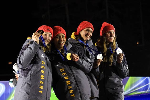 GIOCHI OLIMPICI - Olimpiadi Invernali Milano-Cortina 2026 - Bobsleigh 2-woman Laura Nolte Deborah Levi (GER) 1st place, Gold Medal and Lisa Buckwitz Neele Schuten (GER) 2nd place, Silver Medal on the podium at the Olympic Winter games, Winterspiele,Spiele, Summer games Milano-Cortina 2026, Bobsleigh 2-woman Heat 4 Final on February 21, 2026 at Cortina Sliding Center in Cortina d Ampezzo, Italy Cortina D Ampezzo Italy  Copyright: xIPAxSport ABACAx
