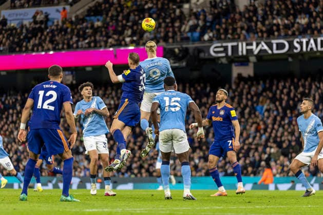 21st February 2026; Etihad Stadium, Manchester, Lancashire, England; Premier League Football, Manchester City versus Newcastle United; Erling Haland of Manchester City heads the ball clear  TimxWilliams Content restricted for UK based newspaper
