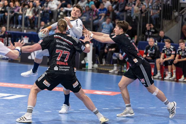 Marko Grgic SG Flensburg Handewitt, 17 Maciej Gebala HC Erlangen, 77 Florian Scheerer HC Erlangen, 10 HC Erlangen vs SG Flensburg Handewitt, Handball, 1 Handball Bundesliga, Season 2025 2026, 22 Matchday, 21 02 2026 HC Erlangen vs SG Flensburg Handewitt, Handball, 1 Handball Bundesliga, Season 2025 2026, 22 Matchday, 21 02 2026 Nuernberg Copyright: xEibner-Pressefoto ArdanxFuessmanx EP_AFN