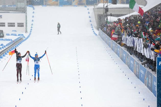 Milano Cortina 2026, Antholz, Italy, 21.02, 2026, MiCo2026, MiCo, 2026, Olympics, Olympic, Winter Olympic, Olympic Winter games, Winterspiele,Spiele, Summer games Antholz, biathlon, Anterselva Biathlon Arena, Anterselva Franziska Preuss from Germany and Dorothea Wierer from Italy celebrate after their 12.5 kilometers Women™s Mass start race of Milano Cortina 2026 Olympic Winter Games in Anterselva Biathlon Arena, Italy, 21.02.2026. Photo: Roman Koksarov (RKF) Antholz Italy Copyright: xRomanxKoksarovx biathlon_MiCo20260221rk710.JPG