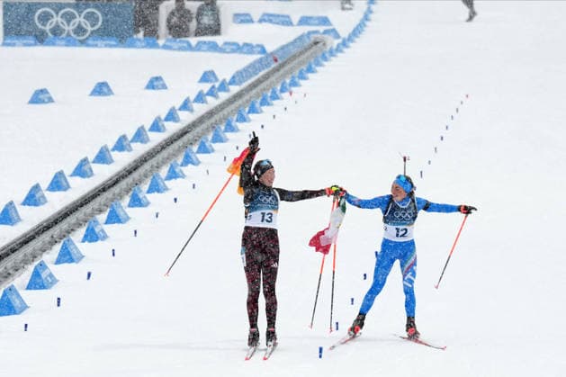 Milano Cortina 2026, Antholz, Italy, 21.02, 2026, MiCo2026, MiCo, 2026, Olympics, Olympic, Winter Olympic, Olympic Winter games, Winterspiele,Spiele, Summer games Antholz, biathlon, Anterselva Biathlon Arena, Anterselva Franziska Preuss from Germany and Dorothea Wierer from Italy celebrate after their 12.5 kilometers Women™s Mass start race of Milano Cortina 2026 Olympic Winter Games in Anterselva Biathlon Arena, Italy, 21.02.2026. Photo: Roman Koksarov (RKF) Antholz Italy Copyright: xRomanxKoksarovx biathlon_MiCo20260221rk716.JPG