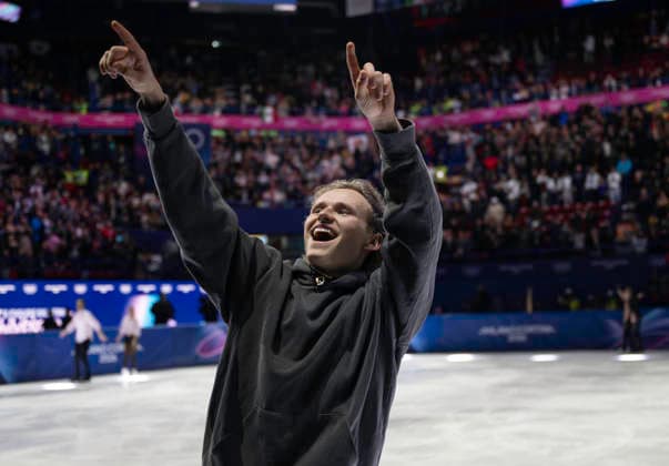 February 21, 2026, Milan, Lombardy, Italy: Team America s LLIA MALININ points to the crowd at the end of the Figure skating, Eiskunstlauf Exhibition Gala at the Milano Cortina 2026 Winter Olympics. Olympics 2026: Milano Cortina: - February 21, 2026  - ZUMAh234 20260221_oly_h234_006 Copyright: xMarkxEdwardxHarrisx