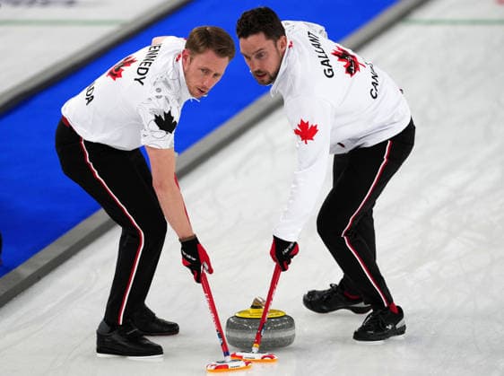 260221 -- CORTINA D AMPEZZO, Feb. 21, 2026 -- Marc Kennedy L and Brett Gallant of Canada compete during the curling men s gold medal game between Canada and Britain at the 2026 Milan-Cortina Winter Olympics in Cortina, Italy, Feb. 21, 2026. MICO2026ITALY-CORTINA D AMPEZZO-OLYMPIC Winter games, Winterspiele,Spiele, Summer games CURLING-MEN-GOLD MEDAL GAME-CAN VS GBR LixGang  (MICO2026)ITALY-CORTINA D AMPEZZO-OLYMPIC WINTER GAMES-CURLING-MEN-GOLD MEDAL GAME-CAN VS GBR IMAGO LixGang  imago images 0848250667