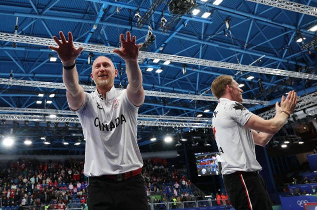 (260222) -- CORTINA D AMPEZZO, Feb. 22, 2026 -- Brad Jacobs (L) of Canada celebrates after the curling men s gold medal game between Canada and Britain at the 2026 Milan-Cortina Winter Olympics in Cortina, Italy, Feb. 21, 2026. ) (MICO2026)ITALY-CORTINA D AMPEZZO-OLYMPIC Winter games, Winterspiele,Spiele, Summer games CURLING-MEN-GOLD MEDAL GAME-CAN VS GBR ZhangxChenlin 