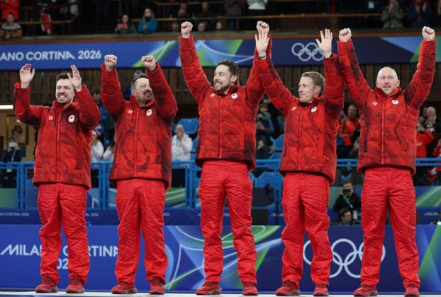 (260222) -- CORTINA D AMPEZZO, Feb. 22, 2026 -- Gold medalists players of Canada celebrate during the awarding ceremony after the curling men s gold medal game between Canada and Britain at the 2026 Milan-Cortina Winter Olympics in Cortina, Italy, Feb. 21, 2026. ) (MICO2026)ITALY-CORTINA D AMPEZZO-OLYMPIC Winter games, Winterspiele,Spiele, Summer games CURLING-MEN-GOLD MEDAL GAME-CAN VS GBR ZhangxChenlin 