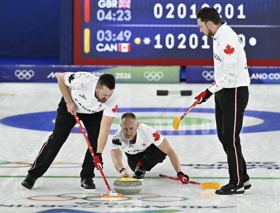 Milan Cortina Olympics: Curling Canada skip Brad Jacobs (C) throws the stone during the ninth end of the Milan Cortina Olympic men s curing final against Britain at Cortina Curling Olympic Stadium in Cortina d Ampezzo, Italy, on Feb. 21, 2026.  A14AA0005313595P