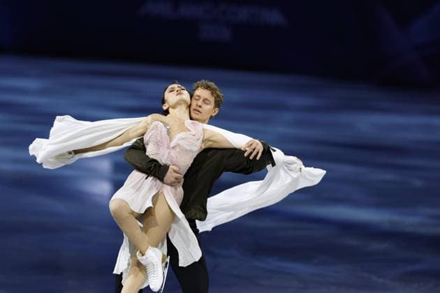 Milan Cortina Olympics: Figure skating, Eiskunstlauf American ice dancers Madison Chock (front) and Evan Bates perform in the figure skating exhibition gala at the Milan Cortina Olympics on Feb. 21, 2026, at Milano Ice Skating Arena in Milan.  A14AA0005313722P