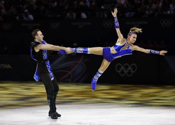 Milan Cortina Olympics: Figure skating, Eiskunstlauf Georgian figure skating pair Anastasiia Metelkina (R) and Luka Berulava perform in the exhibition gala at the Milan Cortina Olympics on Feb. 21, 2026, at Milano Ice Skating Arena in Milan.  A14AA0005313724P