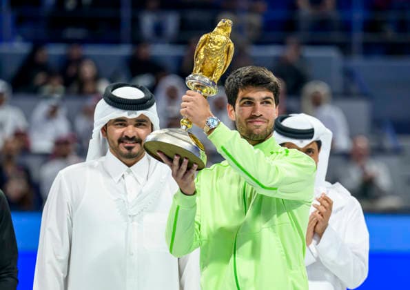 ATP, Tennis Herren Qatar Exxonmobil Open-final Carlos Alcaraz of Spain celebrates with the trophy after winning his men s singles final match against Arthur Fils of France at the ATP Qatar Exxonmobil Open 2026 tennis tournament at the Khalifa International Tennis Complex in Doha, Qatar, on February 21, 2026. DOHA Qatar Copyright: xNOUSHADx