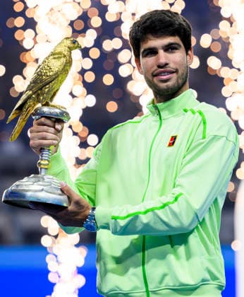 ATP, Tennis Herren Qatar Exxonmobil Open-final Carlos Alcaraz of Spain celebrates with the trophy after winning his men s singles final match against Arthur Fils of France at the ATP Qatar Exxonmobil Open 2026 tennis tournament at the Khalifa International Tennis Complex in Doha, Qatar, on February 21, 2026. DOHA Qatar Copyright: xNOUSHADx