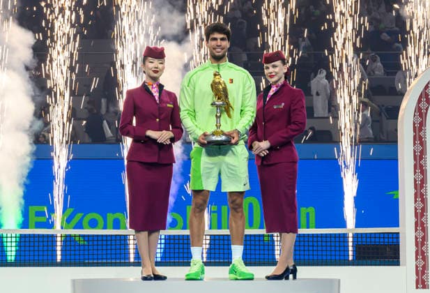 ATP, Tennis Herren Qatar Exxonmobil Open 2026 tennis tournament in Doha - 21 Feb 2026 Carlos Alcaraz of Spain celebrates with the trophy after winning his men s singles final match against Arthur Fils of France at the ATP Qatar Exxonmobil Open 2026 tennis tournament at the Khalifa International Tennis Complex. Carlos Alcaraz won against Arthur Fils 6-2,6-1.???? Doha Qatar Copyright: xNoushadxVariyattiyakkalx xSOPAxImagesx NVRITYAKAL-044