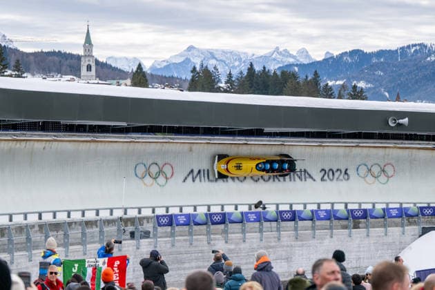 FRIEDRICH Francesco, SOMMER Matthias, SCHUELLER Alexander, STRAUB Felix (Deutschland) in der Zielkurve, dahinter Ortsblick auf Cortina, ITA, Olympische Spiele Milano Cortina 2026, Olympia, Viererbob Herren, Finale, 22.02.2026 ITA, Olympische Spiele Milano Cortina 2026, Olympia, Viererbob Herren, Finale, 22.02.2026 Cortina d Ampezzo *** FRIEDRICH Francesco, SOMMER Matthias, SCHUELLER Alexander, STRAUB Felix Germany in the finish curve, behind them local view of Cortina, ITA, Olympic Games Milano Cortina 2026, Olympia, 4-man bobsleigh men, final, 22 02 2026 ITA, Olympic Games Milano Cortina 2026, Olympia, 4-man bobsleigh men, final, 22 02 2026 Cortina d Ampezzo Copyright: xEibner-Pressefoto Memmlerx EP_MMR