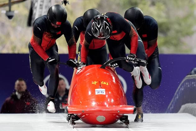 China™s team Bobsleigh 4-man run 3 at the Cortina Sliding Centre at the Milano Cortina 2026 Winter Olympics, in Cortina (Italy) February 22, 2026 (Spada LaPresse)  Copyright: xSpada LaPressex