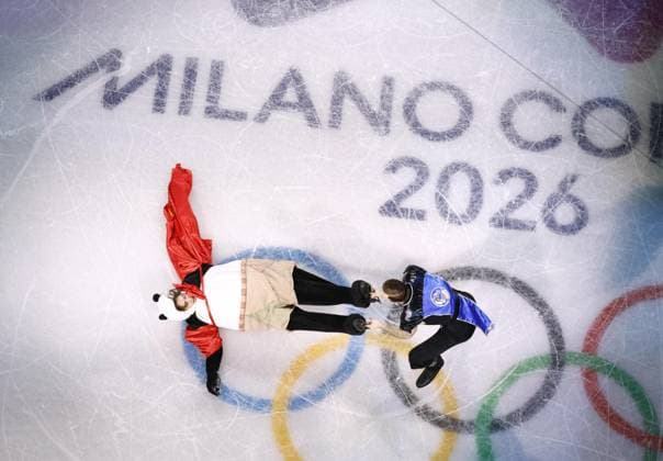 Milan Cortina Olympics: Figure skating, Eiskunstlauf Mikhail Shaidorov (L) of Kazakhstan performs with Luka Berulava of Georgia during the figure skating exhibition gala at the Milan Cortina Olympics on Feb. 21, 2026, at Milano Ice Skating Arena in Milan.  A14AA0005314892P