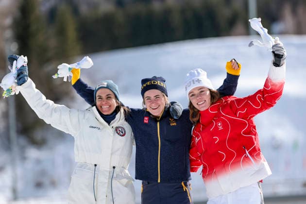 OLYMPICS - Winter Olympic Games, Olympische Spiele, Olympia, OS Milano Cortina 2026 TESERO,ITALY,22.FEB.26 - OLYMPICS, NORDIC SKIING, CROSS COUNTRY SKIING - Winter Olympic Games Milano Cortina 2026, 50km mass start, classic, women, medal ceremony. Image shows the rejoicing of Heidi Weng (NOR), Ebba Andersson (SWE) and Nadja Kaelin (SUI).  GEPAxpictures xMatthiasxTrinkl
