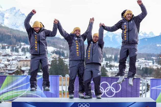 OLYMPICS - Winter Olympic Games, Olympische Spiele, Olympia, OS Milano Cortina 2026 CORTINA D AMPEZZO,ITALY,22.FEB.26 - OLYMPICS, BOBSLEIGH - Winter Olympic Games Milano Cortina 2026, 4-man, heat 3 and 4. Image shows the rejoicing of Johannes Lochner, Thorsten Margis, Jorn Wenzel and Georg Fleischhauer (GER).  GEPAxpictures xMaticxKlansek