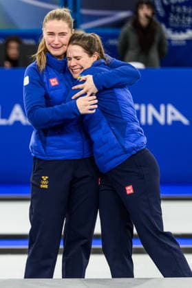260222 Johanna Heldin, Sofia Scharback, Agnes Knochenhauer, Sara McManus and Anna Hasselborg of Sweden celebrate first place on the podium after winning the women s gold medal curling match between Switzerland and Sweden during day 16 of the 2026 Winter Olympics on February 22, 2026 in Cortina. Photo: Jon Olav Nesvold BILDBYRAN COP 217 JE0130 jubel curling Olympic Games, Olympische Spiele, Olympia, OS olympics winter olympics os ol olympiska spel vinter-os olympiske leker milano cortina 2026 milan cortina 2026 milano cortina 2026 olympic games milano cortina 2026 winter olympic games milano cortina-os milano cortina-ol vinter-ol 16 bbeng schweiz sveits sweden sverige dam *** 260222 Johanna Heldin, Sofia Scharback, Agnes Knochenhauer, Sara McManus and Anna Hasselborg of Sweden celebrate first place on the podium after winning the women s gold medal curling match between Switzerland and Sweden during day 16 of the 2026 Winter Olympics on February 22, 2026 in Cortina Photo Jon Olav Nesvold BILDBYRAN COP 217 JE0130 jubilation curling olympic games olympics winter olympics os ol olympiska spel vinter os olympiske leker milano cortina 2026 milan cortina 2026 milano cortina 2026 olympic games milano cortina 2026 winter olympic games milano cortina os milano cortina ol vinter ol 16 bbeng schweiz sveits sweden sverige dam  Copyright: JONxOLAVxNESVOLD BB260222JE086
