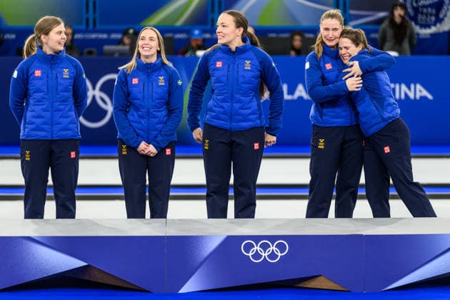 260222 Johanna Heldin, Sofia Scharback, Agnes Knochenhauer, Sara McManus and Anna Hasselborg of Sweden celebrate first place on the podium after winning the women s gold medal curling match between Switzerland and Sweden during day 16 of the 2026 Winter Olympics on February 22, 2026 in Cortina. Photo: Jon Olav Nesvold BILDBYRAN COP 217 JE0130 jubel curling Olympic Games, Olympische Spiele, Olympia, OS olympics winter olympics os ol olympiska spel vinter-os olympiske leker milano cortina 2026 milan cortina 2026 milano cortina 2026 olympic games milano cortina 2026 winter olympic games milano cortina-os milano cortina-ol vinter-ol 16 bbeng schweiz sveits sweden sverige dam *** 260222 Johanna Heldin, Sofia Scharback, Agnes Knochenhauer, Sara McManus and Anna Hasselborg of Sweden celebrate first place on the podium after winning the women s gold medal curling match between Switzerland and Sweden during day 16 of the 2026 Winter Olympics on February 22, 2026 in Cortina Photo Jon Olav Nesvold BILDBYRAN COP 217 JE0130 jubilation curling olympic games olympics winter olympics os ol olympiska spel vinter os olympiske leker milano cortina 2026 milan cortina 2026 milano cortina 2026 olympic games milano cortina 2026 winter olympic games milano cortina os milano cortina ol vinter ol 16 bbeng schweiz sveits sweden sverige dam  Copyright: JONxOLAVxNESVOLD BB260222JE087