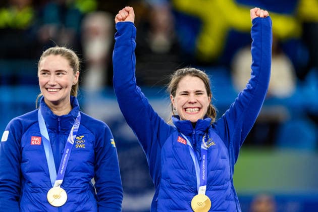 260222 Sara McManus and Anna Hasselborg of Sweden celebrate with their gold medals on the podium after winning the women s gold medal curling match between Switzerland and Sweden during day 16 of the 2026 Winter Olympics on February 22, 2026 in Cortina. Photo: Jon Olav Nesvold BILDBYRAN COP 217 JE0130 jubel curling Olympic Games, Olympische Spiele, Olympia, OS olympics winter olympics os ol olympiska spel vinter-os olympiske leker milano cortina 2026 milan cortina 2026 milano cortina 2026 olympic games milano cortina 2026 winter olympic games milano cortina-os milano cortina-ol vinter-ol 16 bbeng schweiz sveits sweden sverige dam guld gold *** 260222 Sara McManus and Anna Hasselborg of Sweden celebrate with their gold medals on the podium after winning the women s gold medal curling match between Switzerland and Sweden during day 16 of the 2026 Winter Olympics on February 22, 2026 in Cortina Photo Jon Olav Nesvold BILDBYRAN COP 217 JE0130 jubilation curling olympic games olympics winter olympics os ol olympiska spel vinter os olympiske leker milano cortina 2026 milan cortina 2026 milano cortina 2026 olympic games milano cortina 2026 winter olympic games milano cortina os milano cortina ol vinter ol 16 bbeng schweiz sveits sweden sverige dam guld gold  Copyright: JONxOLAVxNESVOLD BB260222JE095