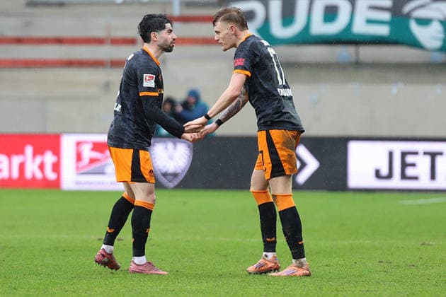 22 02 2026, xrekx, Fußball 2 Bundesliga, Preußen Münster 1 FC Kaiserslautern v l Torjubel nach dem Tor zum celebrating the goal celebrate 1 3 durch Norman Bassette 1 FC Kaiserslautern Semih Sahin 1 FC Kaiserslautern DFL DFB REGULATIONS PROHIBIT ANY USE OF PHOTOGRAPHS as IMAGE SEQUENCES and or QUASI VIDEO Münster