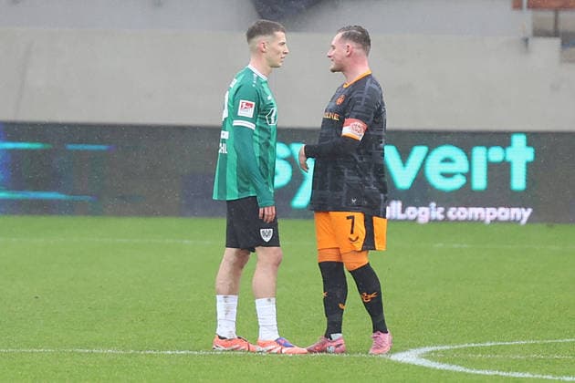 22 02 2026, xrekx, Soccer 2 Bundesliga, Preußen Münster 1 FC Kaiserslautern v l Tobias Raschl Preussen Muenster Marlon Ritter 1 FC Kaiserslautern after the penalty kick DFL DFB REGULATIONS PROHIBIT ANY USE OF PHOTOGRAPHS as IMAGE SEQUENCES and or QUASI VIDEO Münster
