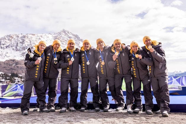 CORTINA, ITALY - FEBRUARY 22: Silver medalists Francesco Friedrich Matthias Sommer Alexander Schueller Felix Straub (Germany) and Gold medalists Johannes Lochner Thorsten Margis Jorn Wenzel Georg Fleischhauer (Germany) pose together during the Bobsleigh 4-man medal ceremony at the Milano Cortina 2026 Olympics at Cortina Sliding Centre on day 16 of the Milano Cortina 2026 Olympics on February 22, 2026 in Cortina, Italy. Editorial use only. Italy Copyright: xSteffiexWunderlx