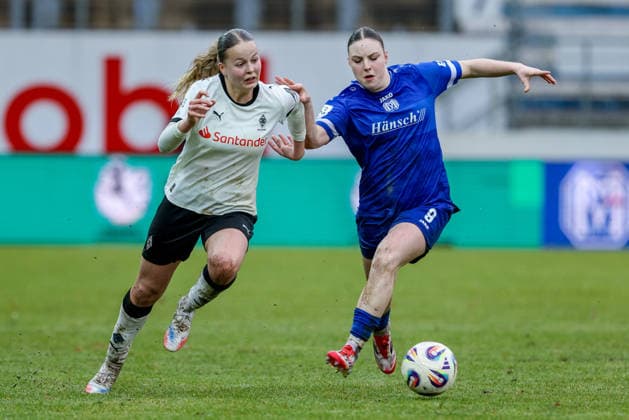 from left Sophia Gerber Borussia Mönchengladbach, 4 and Marleen Kropp SV Meppen, 9 in a duel, dynamic, action, action, game scene, THE DFB REGULATIONS PROHIBIT ANY USE OF PHOTOGRAPHS AS IMAGE SEQUENCES AND OR QUASI VIDEO , 22 02 2026, Meppen Germany , Football, 2 Womens Bundesliga, SV Meppen Borussia Mönchengladbach xobx