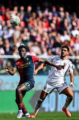February 22, 2026, Genova, Italy: Genoa™s Italian forward Jeff Ekhator (left) and Torino™s Equato-Guinean defender Saul Coco during the Italian Serie A soccer match Genoa Cfc vs Torino Fc at Luigi Ferraris stadium in Genoa, Italy, 3 February 2026. ANSA STRINGER Serie A: Genoa - Torino  - ZUMAa110 20260222_zaf_a110_050 Copyright: xStringerx