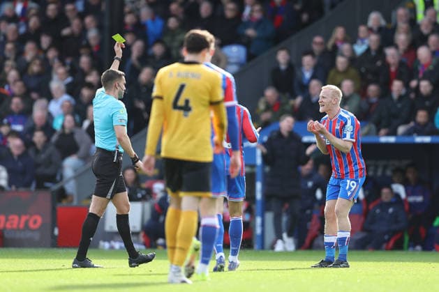 22nd February 2026; Selhurst Park, Selhurst, London, England; Premier League Football, Crystal Palace versus Wolverhampton Wanderers; Will Hughes of Crystal Palace receives a yellow card for a foul on Jean-Ricner Bellegarde of Wolverhampton Wanderers  KatiexChan Content restricted for UK based newspaper